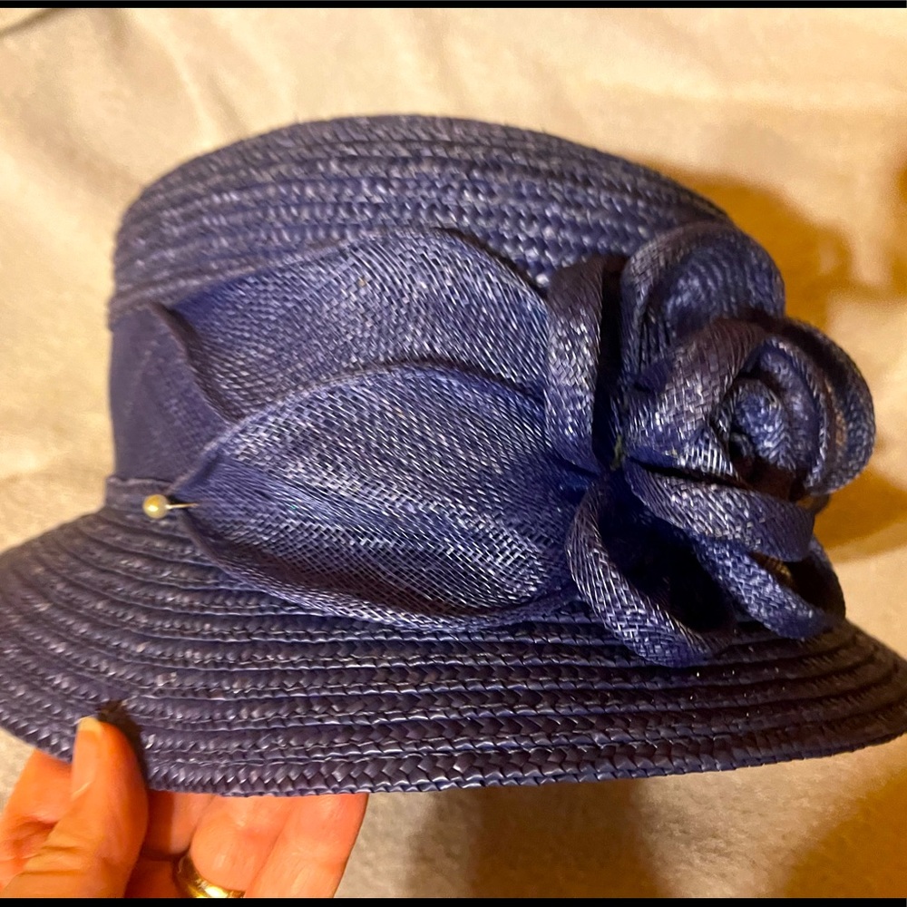 Blue hat with a purplish tint